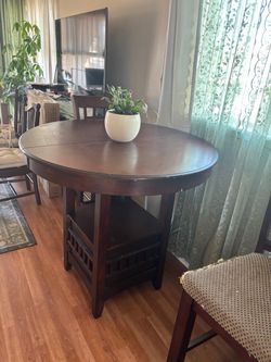 Round Dark Wood Counter Height Dining Table