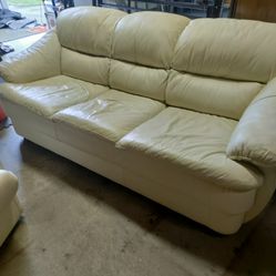 Leather Sofa And Matching Swivel Chair 