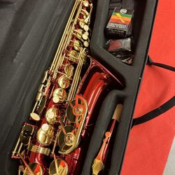 Nice Red and Gold Alto Saxophone with New Box of Reeds $380 Firm