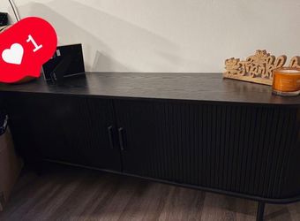 Black soft couch and slide drawer tv stand