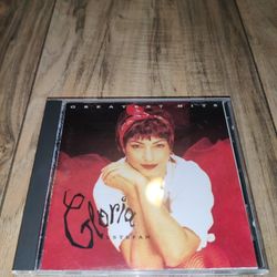 Gloria Estefan : Greatest Hits Latin Pop/Rock 1 Disc CD. Has some wear from age and use. Sold as is.

