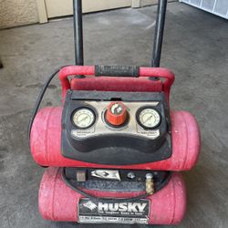 husky the toughest name in tools air compressor 4 gallon