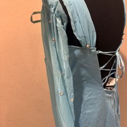 Blue prom dress and tie back. Size: 9 #prom #eveningwear #formal Alterations were made and added straps and one removable sleeve. In good condition 