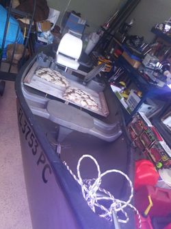 15 foot canoe with clean title $900 also has a carrier