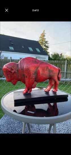 The red buffalo statue