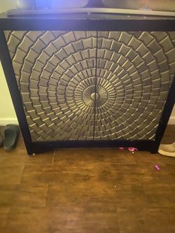 Black and gold cabinet or stand