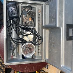 Dremel With Charger And Accessories