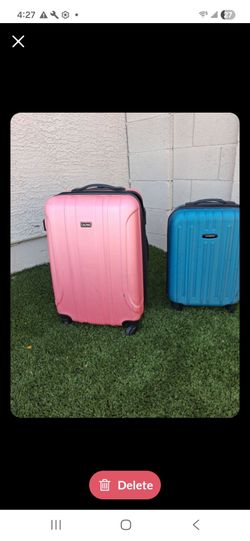 Samsonite and Calpak suitcases