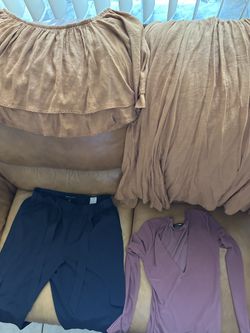Two Bags Full Of Clothing $1.00 Each Piece