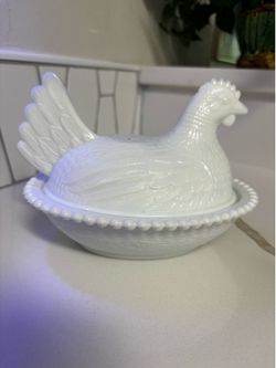 Milk glass hen in nest, It has a small chip on the edge, but it's not noticeable