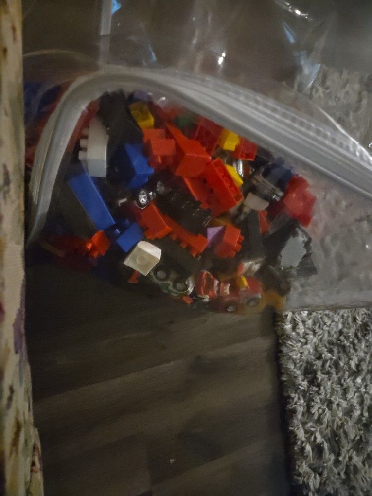 Colorfully Assorted Cars And Building Legos