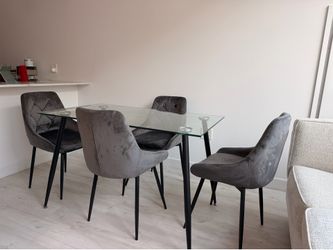 Small rectangular glass dining table  (Chairs have been sold)