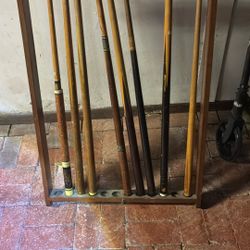 Eight Pool Cues And Some Extra Parts And A Rack To Hold Them Cool For Your Man Cave