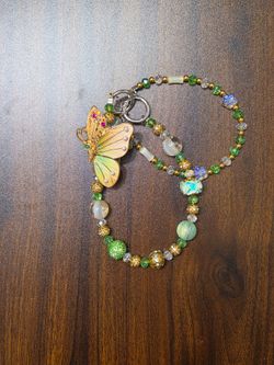 Beautiful yellow green butterfly bag chain