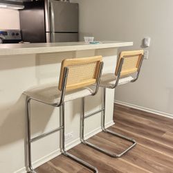 White Rattan Barstools (both)