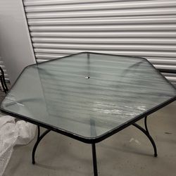 Outdoor glass patio table with 5 chairs