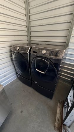 Samsung washer dryer set on pedestal