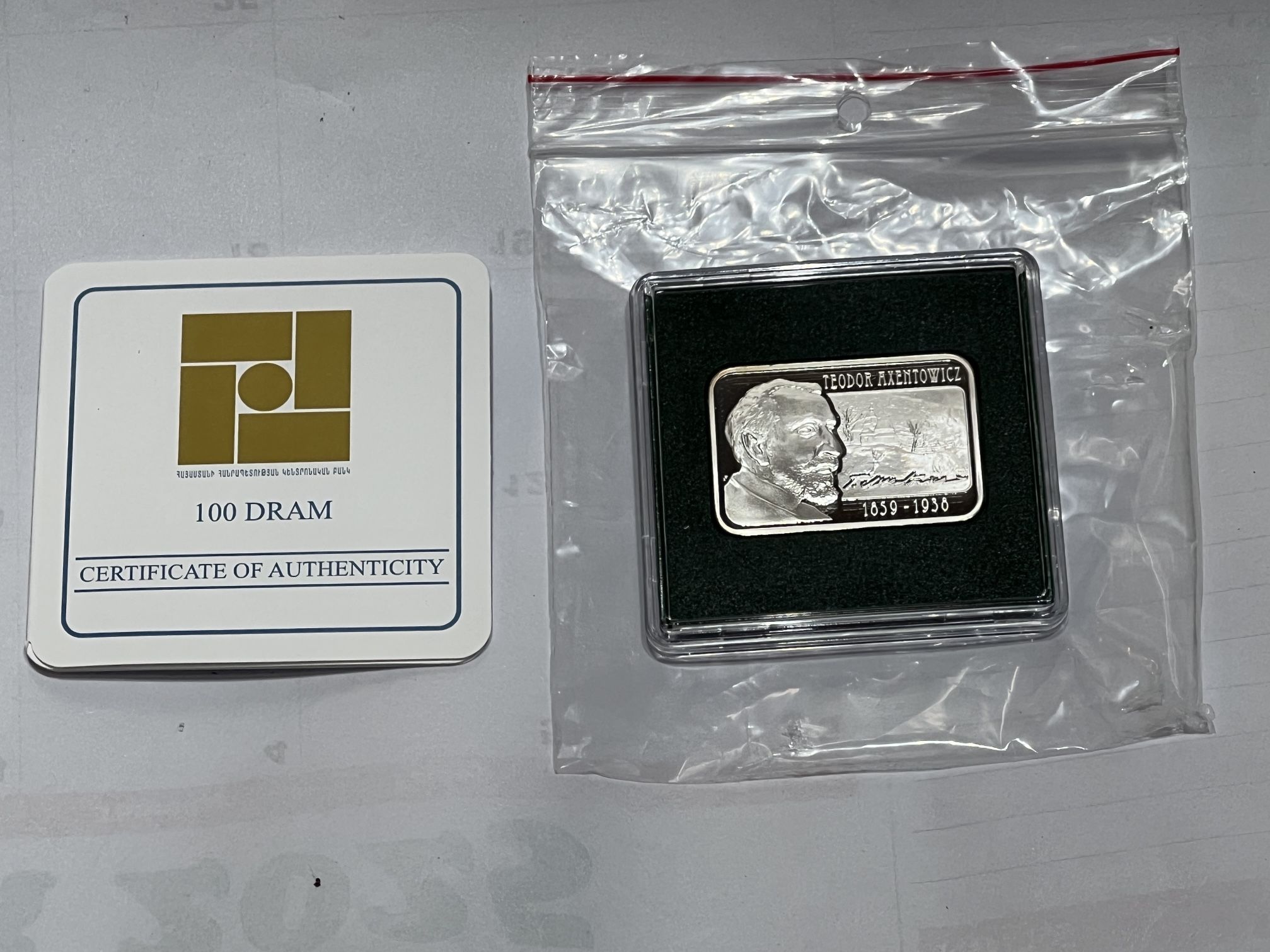 The Armenia 2010 100 dram Axentowicz Teodor Proof Silver Coin is an uncirculated silver coin from Armenia, specifically minted in the year 2010 with S