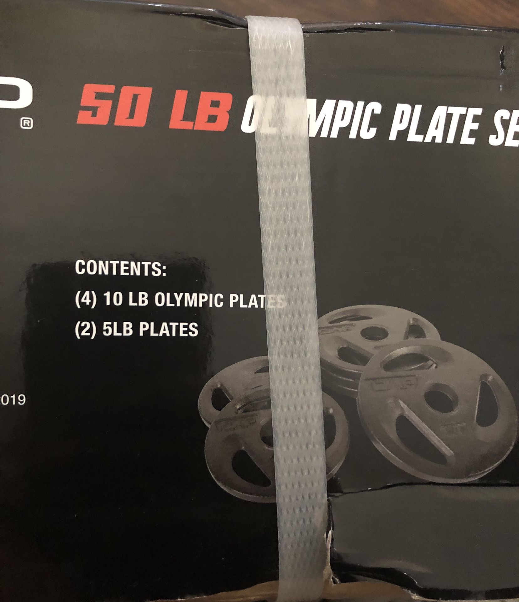 50 lb Olympic Place Set. (4) 10lb plates (5)lb plate