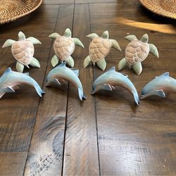Set of eight wood sea creatures napkin ring holders