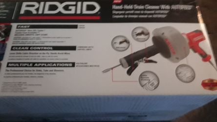 Rigid hand held drain cleaner with auto feed brand new In box