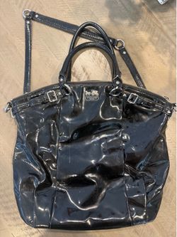 Coach Madison Lindsey satchel made of crinkled patent leather with silver-tone hardware.