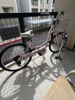 Pink Fuji women’s cruiser bike w basket & pump