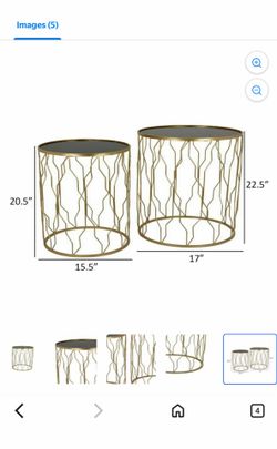 Two gold mirror end tables