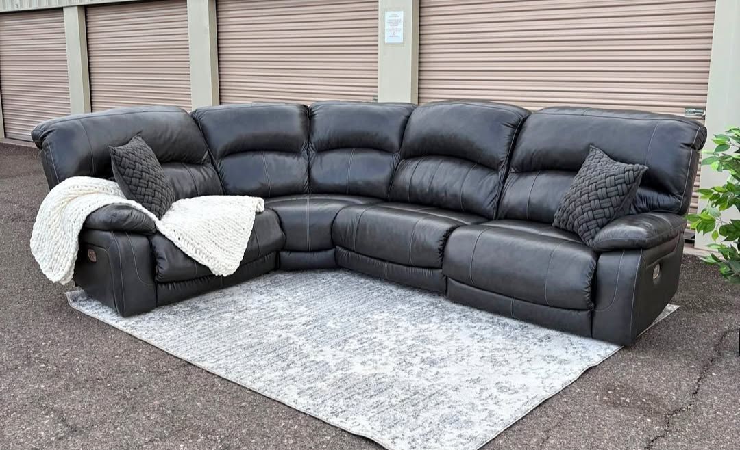 Double recline leather L shaped modular couch from Ashley