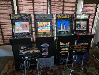 4 Arcade 1up arcade games (14 games total) with risers and stool.