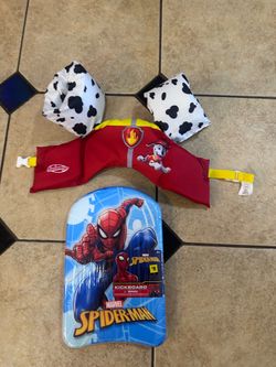 Paw patrol swim floaties vest $12 and spider man surf board, $5