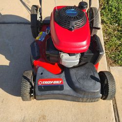 Two Troy Bilt Mowers With Honda Engine On Them 