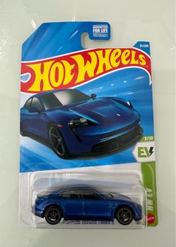 New Hot Wheels Porsche Taycan Turbo S die-cast car is blue with a black base and interior.  Pick up only in West Lancaster Cash only