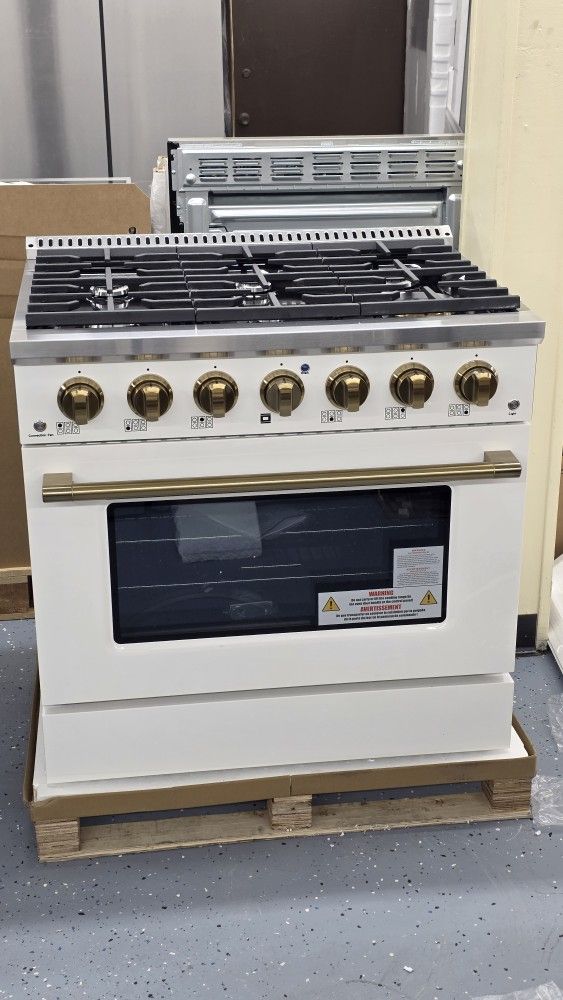 Brand new 36-in 6 burner gas range and white and brass Trim
