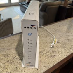 Arris Surfboard SVG2842AC (24x8) DOCSIS Cable Modem Plus AC1750 Dual Band Wi-Fi Router & Xfinity Telephone, 1 Gbps Max Speed