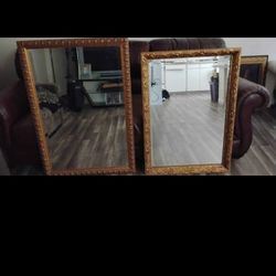 Two Gold Framed Mirrors
