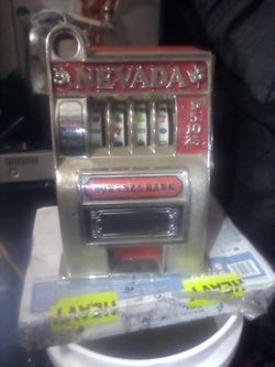 Mini jackpot machine putreal money in it and pays real jackpot 50 bucks