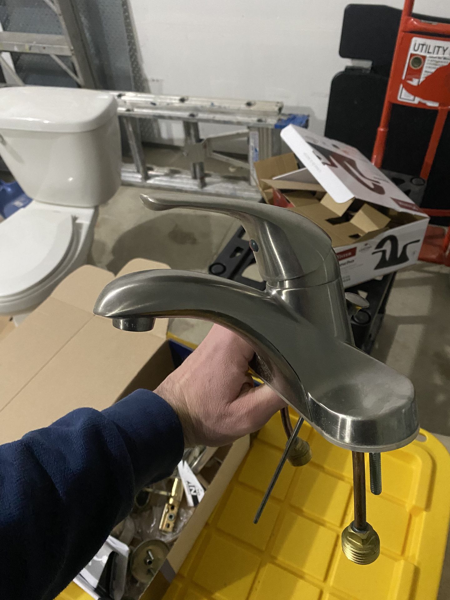 Single-handle, low-arc bathroom faucet in a brushed nickel finish