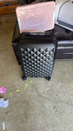 New hardshell carry on has a dent