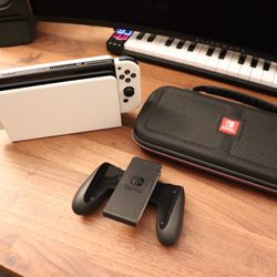 Nintendo Switch OLED - Excellent Condition + Dock, Controller Grip, & Travel Case