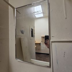 Mirrored medicine cabinet