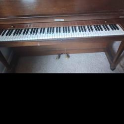 Baldwin oak piano 