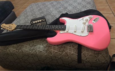 Pink electric guitar for sale