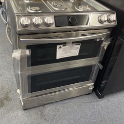 New Scratch And Dent Samsung 5 Burner gas Stainless Steel Slide In Double Oven Range. 1 Year Warranty 