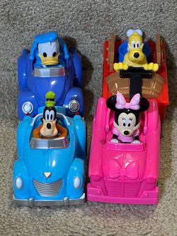 Disney Character Cars pull back racer Donald, Goofy, Pluto, and Minnie
