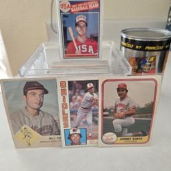 Baseball cards and Broncos polo shirt 
