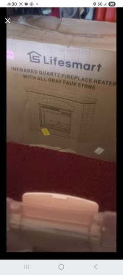 BRAND NEW!! LIFESMART INFRARED QUARTZ FIREPLACE HEATER, WITH ALL GRAY FAUX STONE. ELECTRIC
