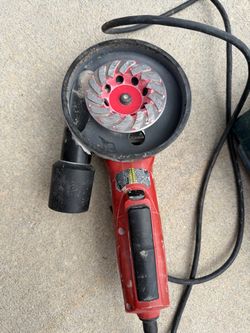 Milwaukee corded 4.5 inch cut off wheel with HEPA tubing