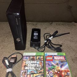 Xbox 360 with Games, Cords and 2 Controllers. 4GB   Used in good condition   