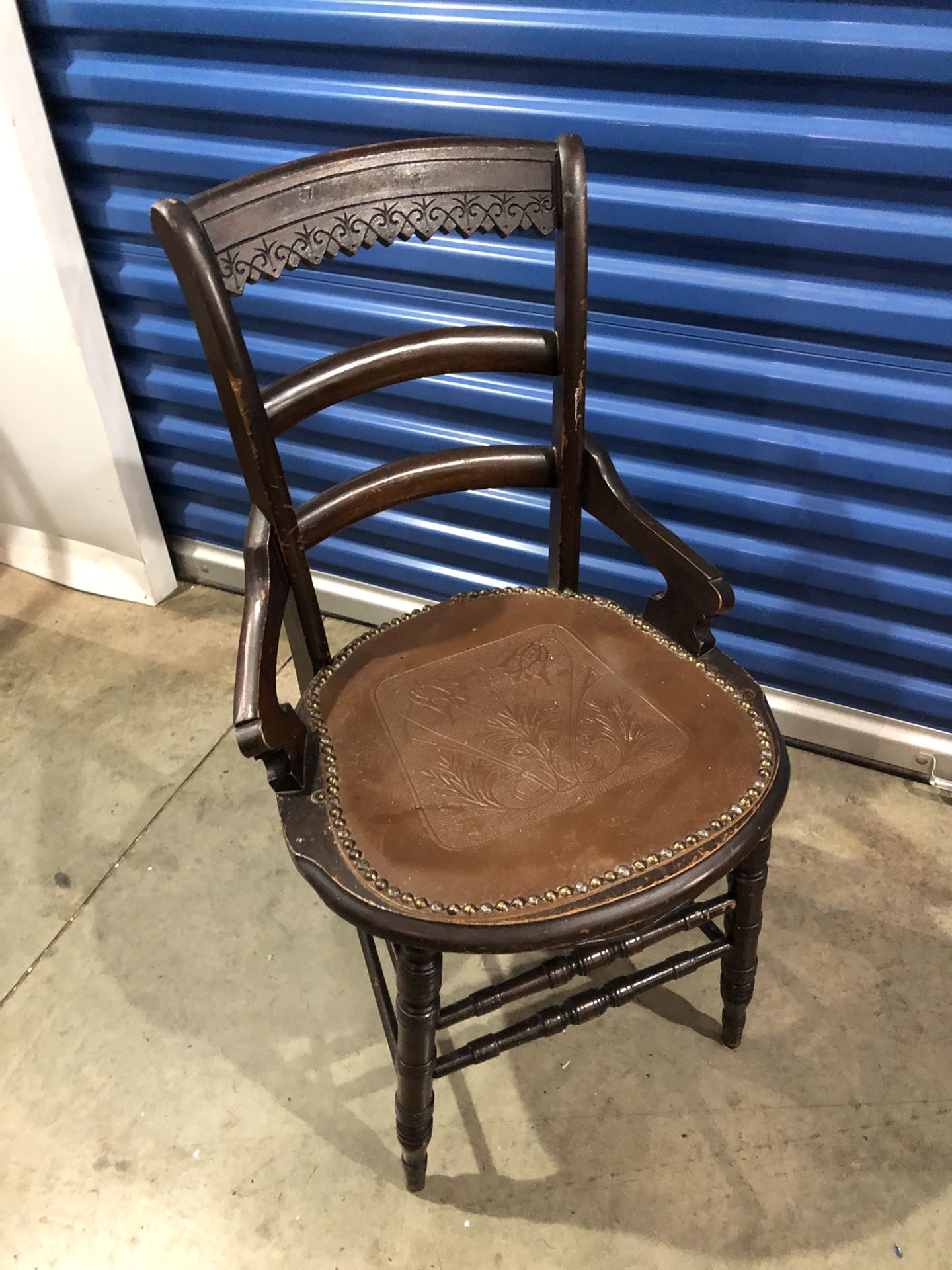 Antique chair leather padded seat